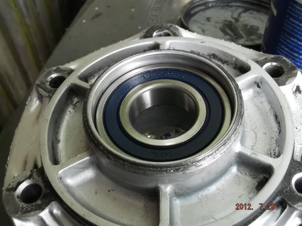 How to Replace rear wheel bearings (including sprocket carrier and seals)